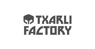 a black and white logo with the words taxi factory