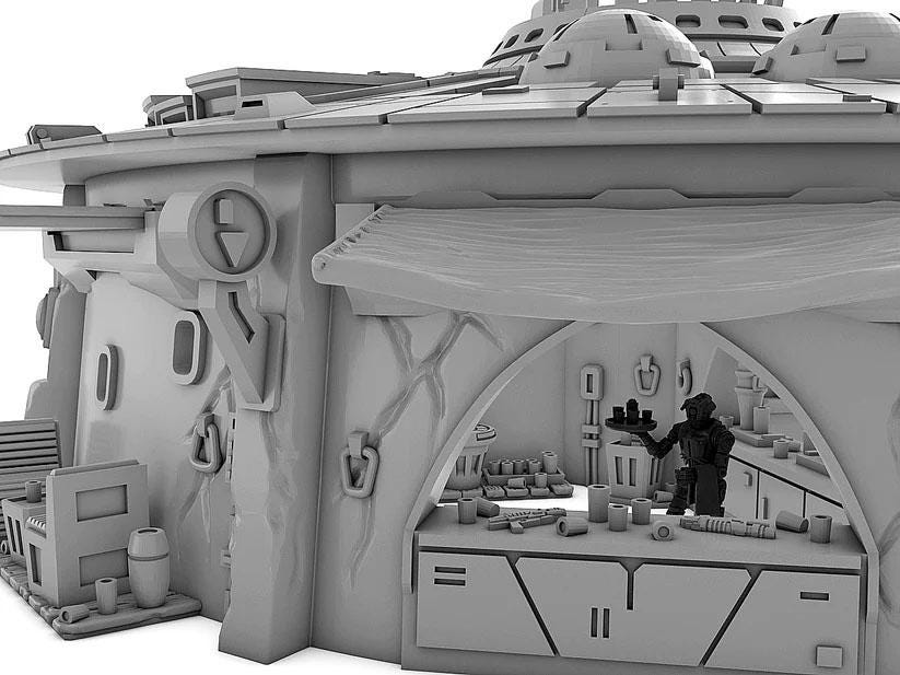 a model of a building with a man standing in front of it